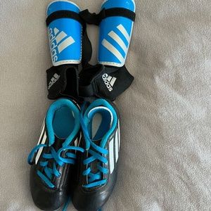 Adidas Boys soccer cleats with shin guards